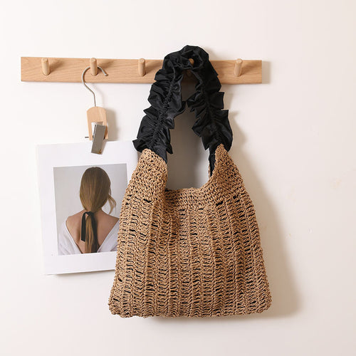 Elegant handbag with ruched decorative handle Skanto