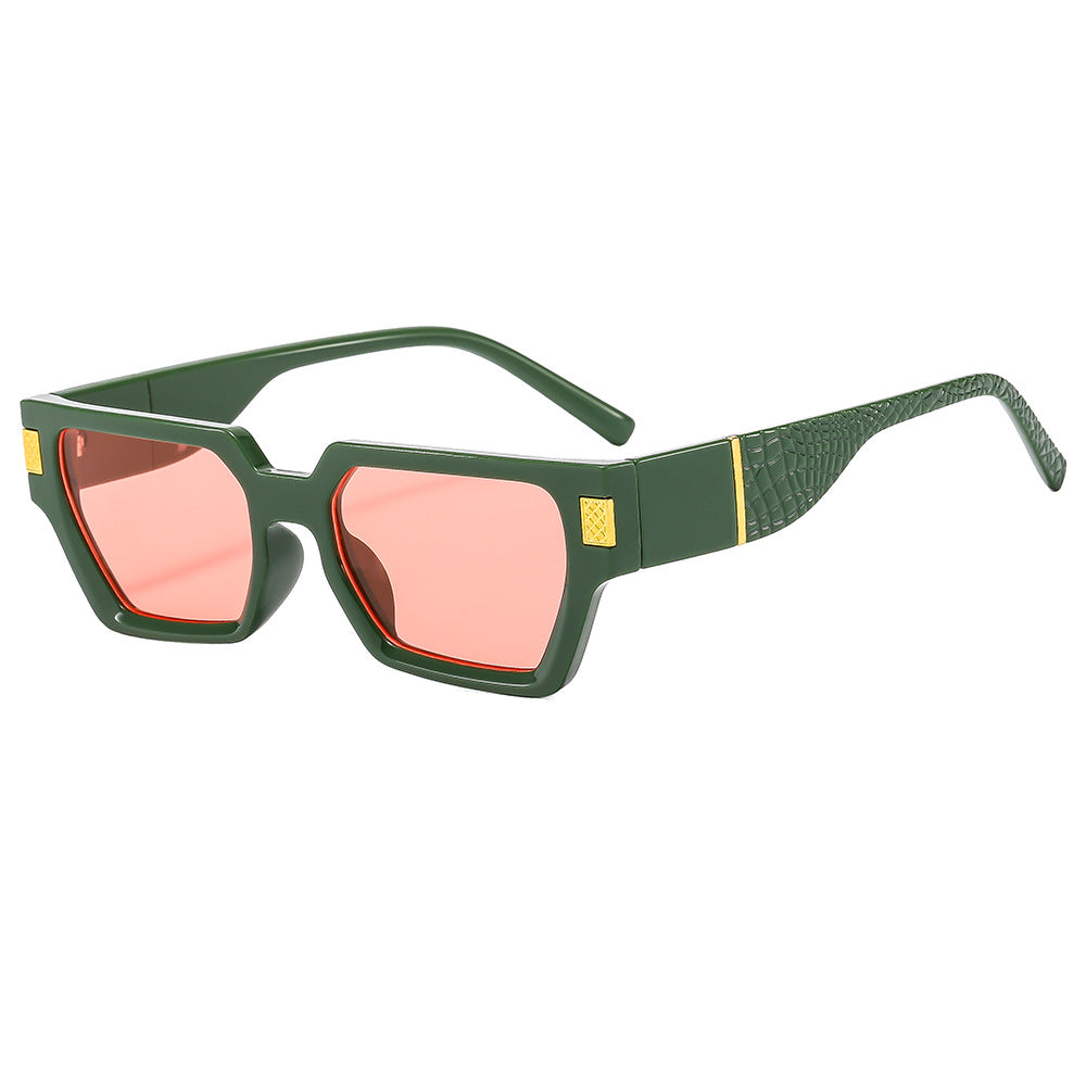Dame Modish solbrille i markant design med Honeyglass og strukturert ramme Skanto
