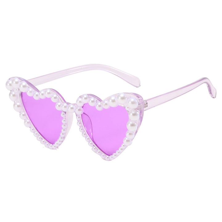 Dame hjerteformet solbrille med perlebesatt ramme Skanto