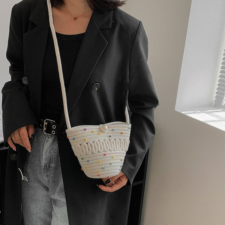 Playful handbag made of braided material Skanto