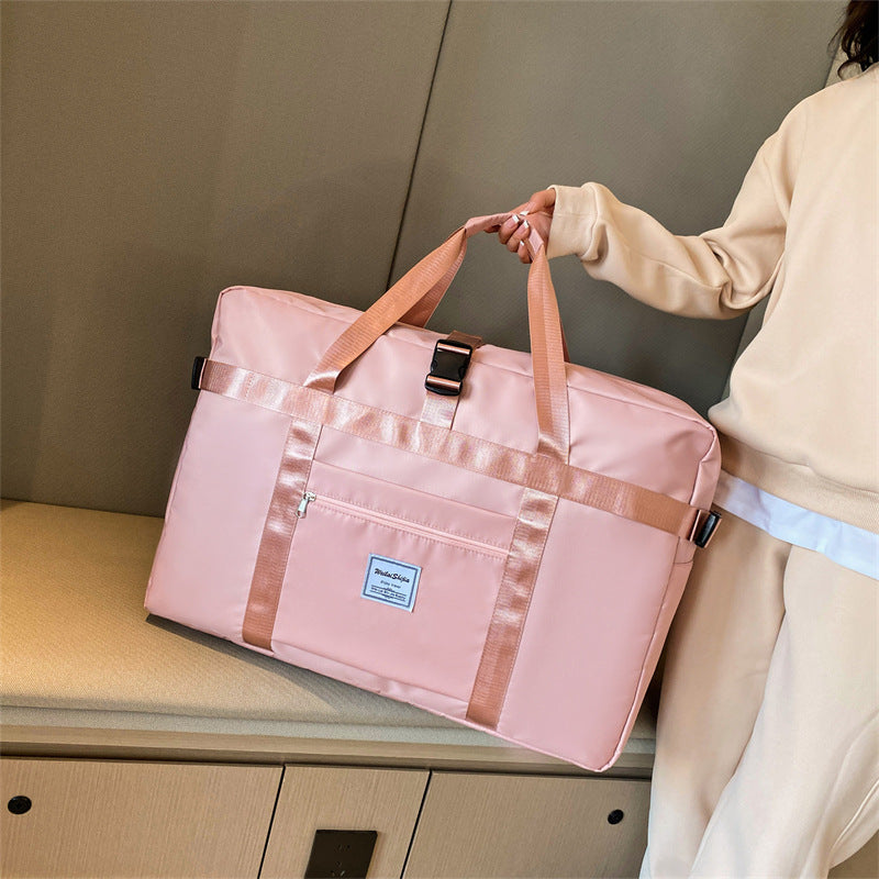 Stort sports-duffelbag med slitesterkt yttermateriale og smart rominndeling Skanto