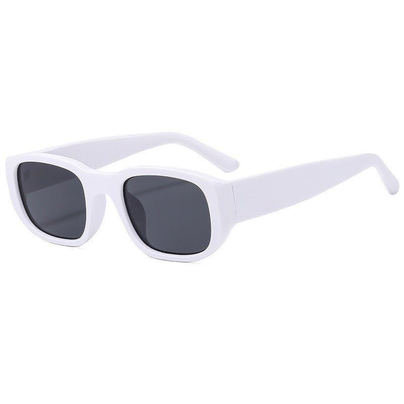 Dame moteriktig solbrille med innovativ, rektangulær ramme Skanto