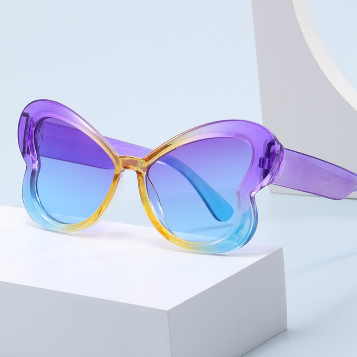 Dame Oversized-solbrille i leken sommerfugl-design Skanto