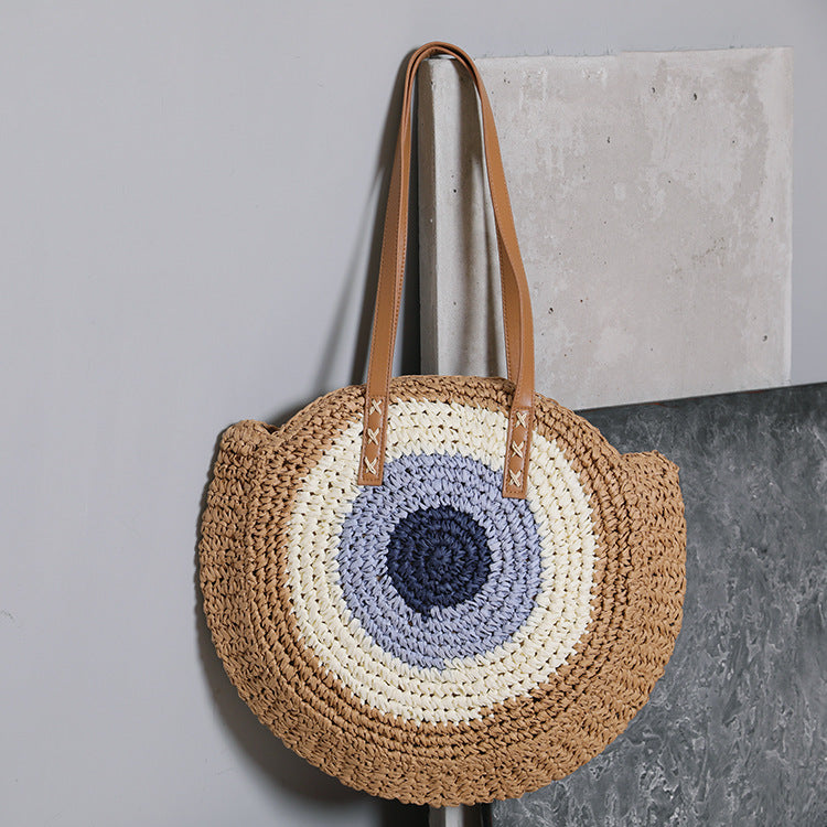 Rund kurvveske med moderne design Skanto