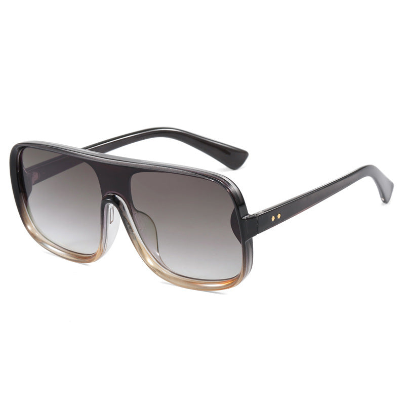 Dame moteriktig Shield-solbrille med innovativ design Skanto
