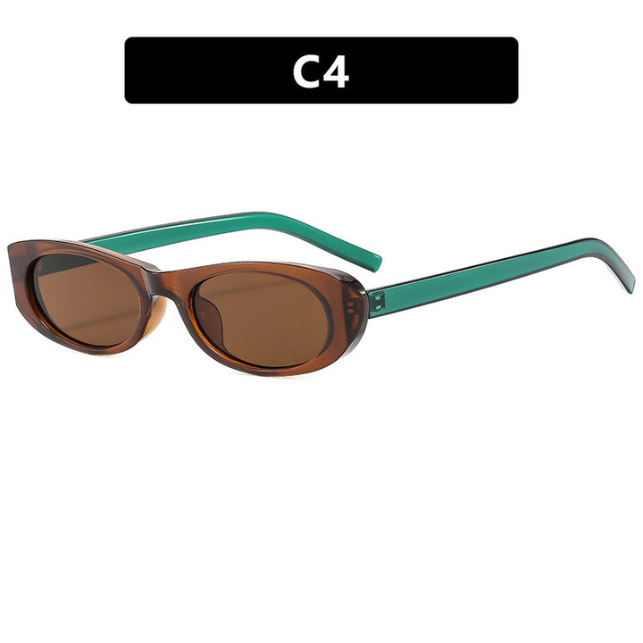 Dame moteriktig solbrille i elegant oval ramme Skanto