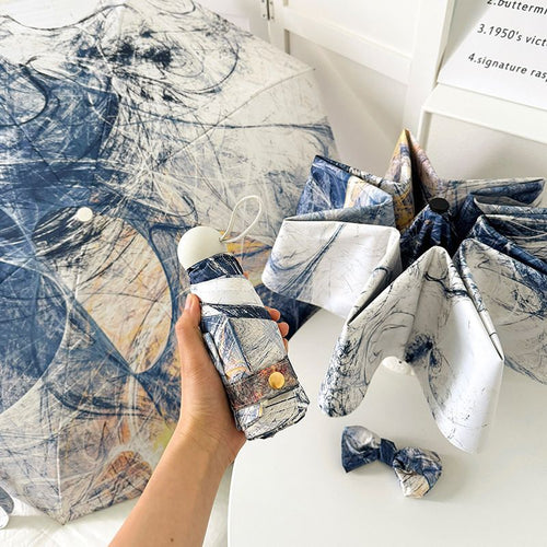 Dame sammenleggbart paraply med kunstnerisk design og automatisk åpne mekanisme Skanto