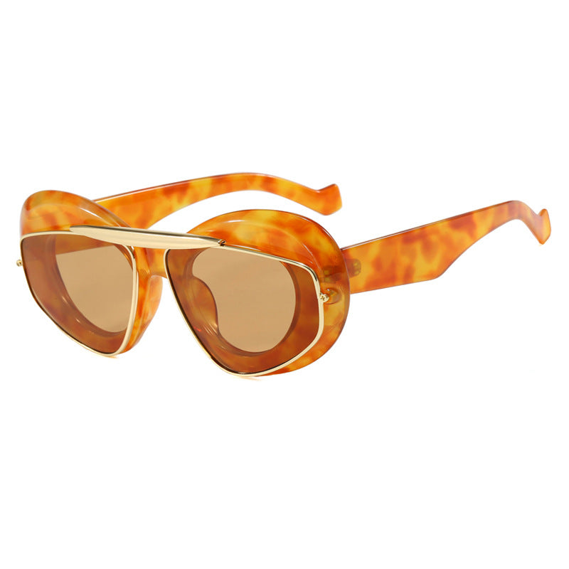 Dame futuristisk solbrille med elegant ramme Skanto