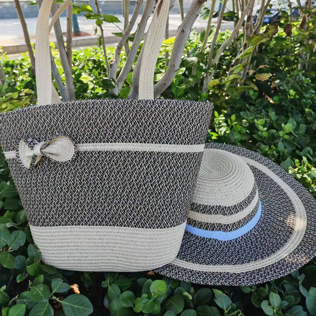 Elegante solhatt med bred brem og diskret stripemønster Skanto