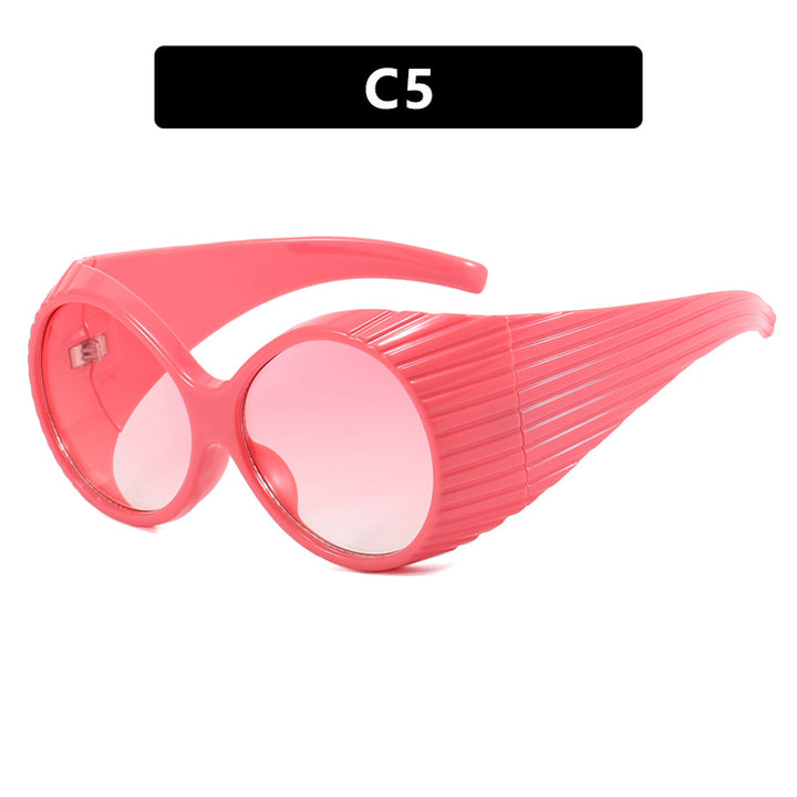 Women's extravagant sunglasses with curved frame Skanto