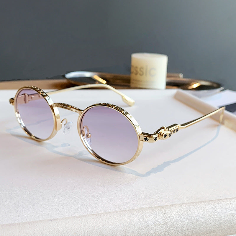 Dame Elegant solbrille med filigran detaljer Skanto