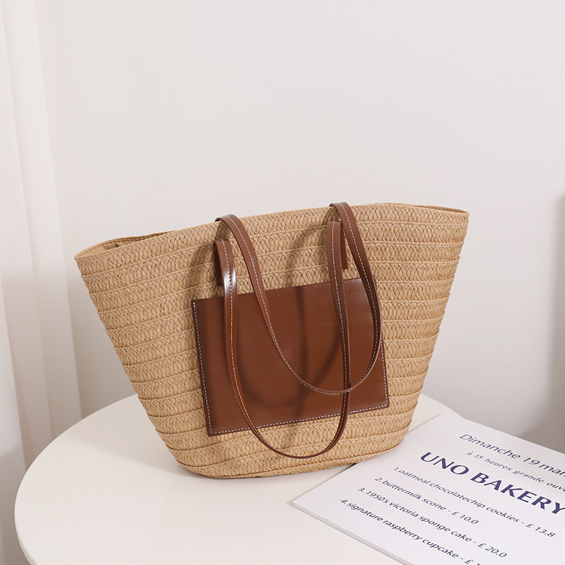 Elegant straw bag with stylish leather details Skanto