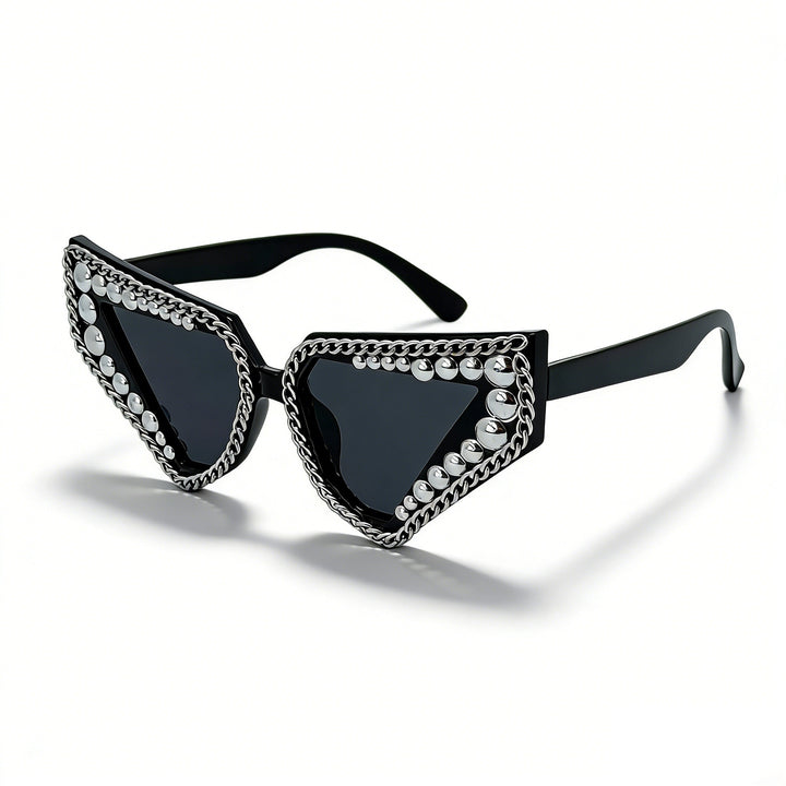 Dame solbrille med unik trekantet ramme og glitrende accenter Skanto