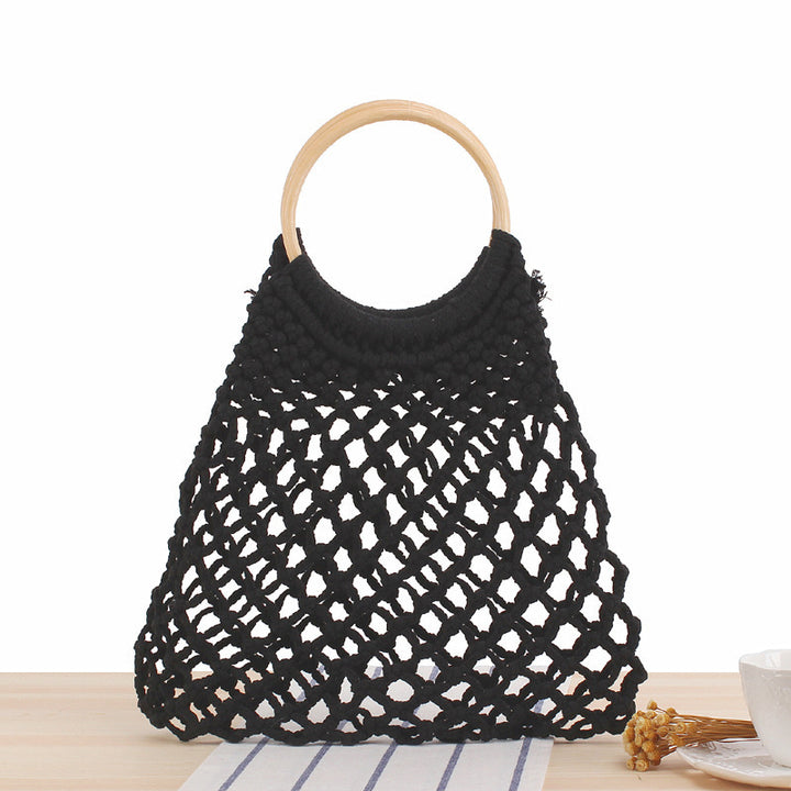 Handbag with artistic mesh design Skanto