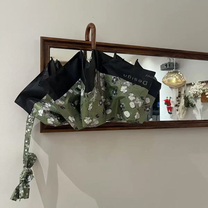 Dame Faltparaply med stilfullt blomsterdesign Skanto
