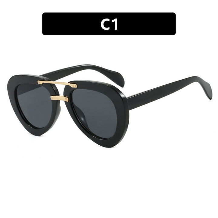 Women's extravagant sunglasses in modern heart design Skanto