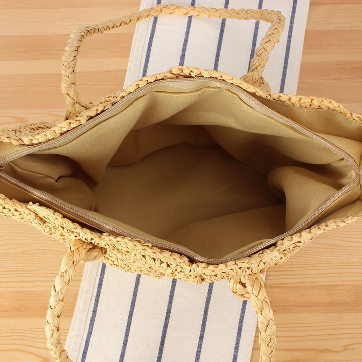 Hand-knotted beach bag with decorative motif Skanto