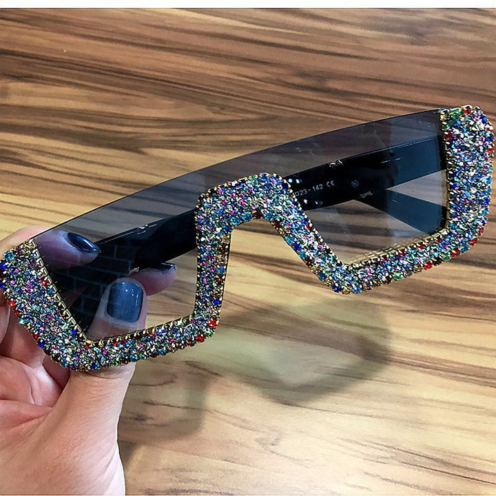 Dame elegant glitter-solbriller med markant ramme Skanto