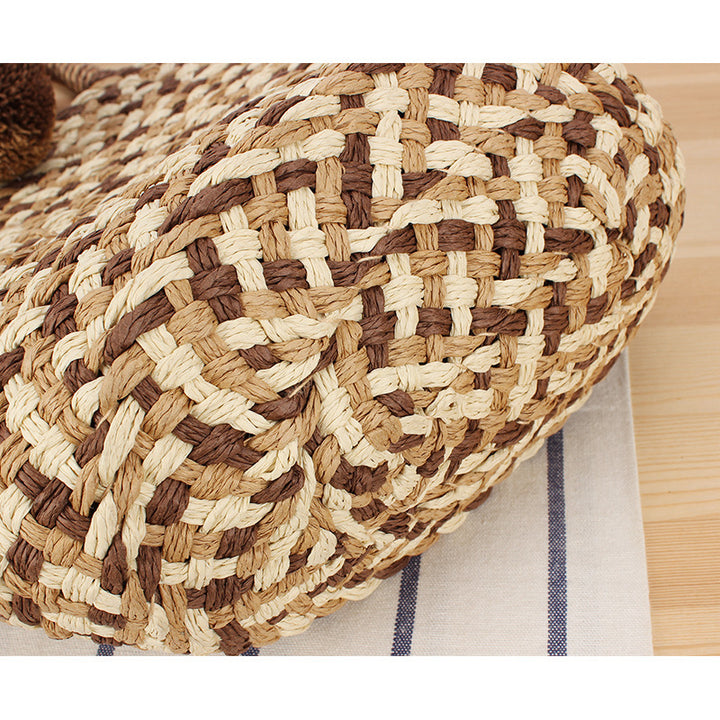 Modern basket bag with decorative pom poms Skanto