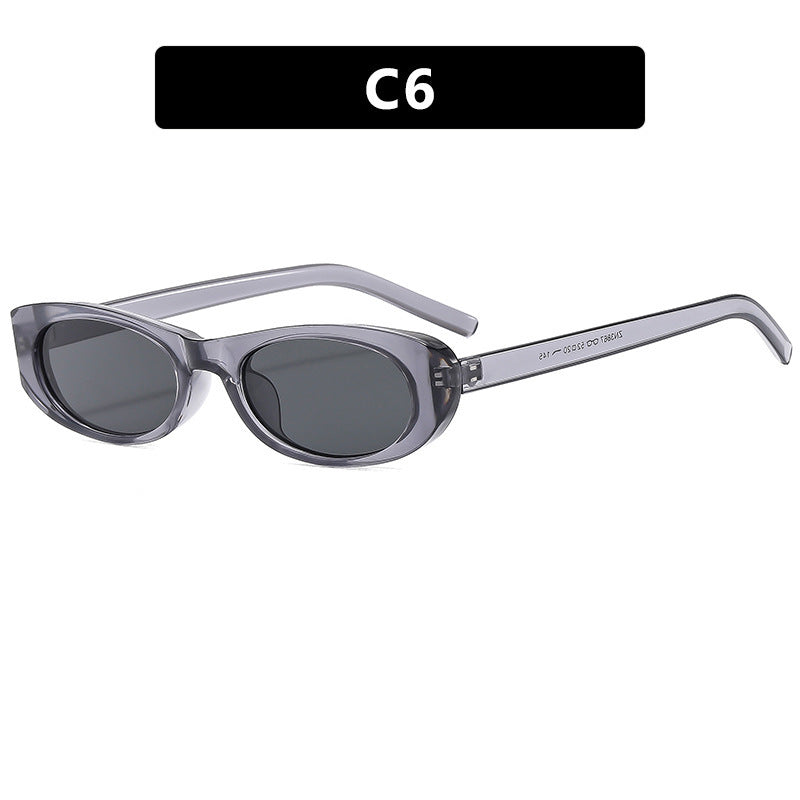 Dame moteriktig solbrille i elegant oval ramme Skanto