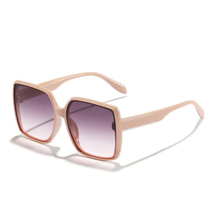 Dame oversized solbrille med moderne kvadratisk ramme og beskyttende glass Skanto