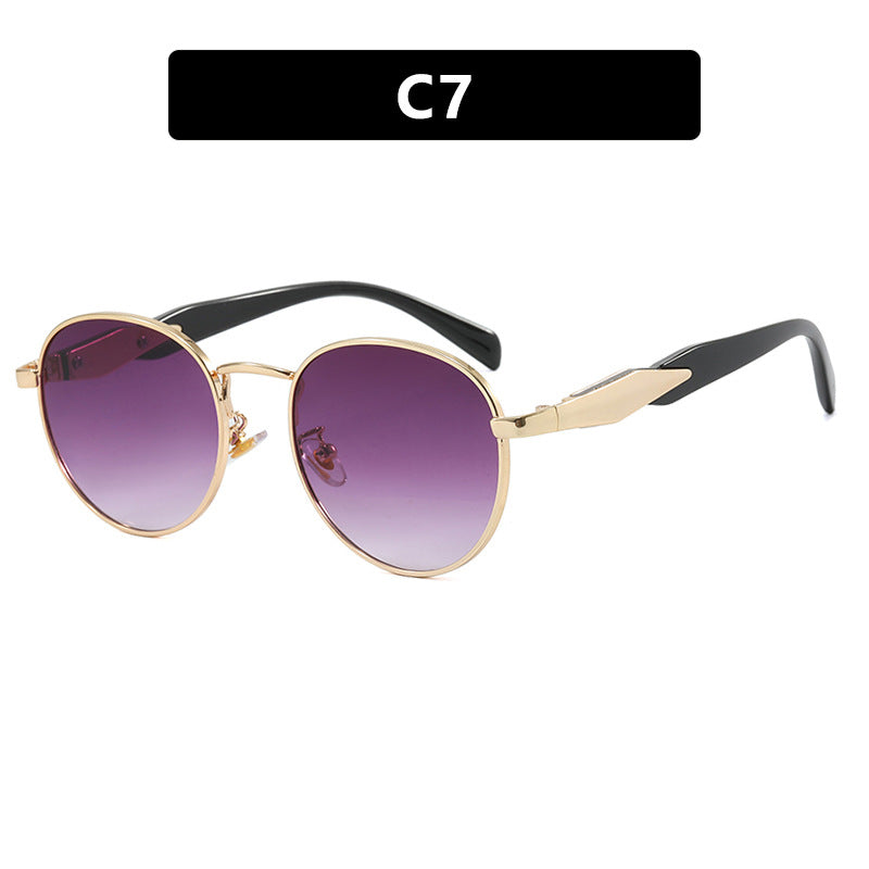 Women's round sunglasses with elegant, gold frame and UV protection Skanto