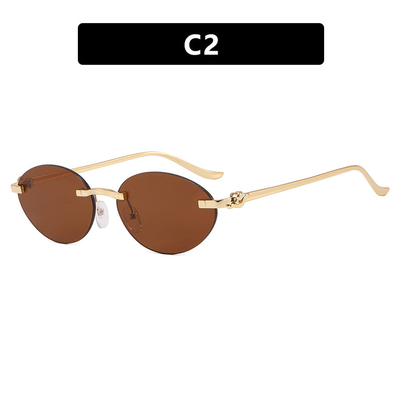 Women's elegant oval sunglasses with gold accent Skanto
