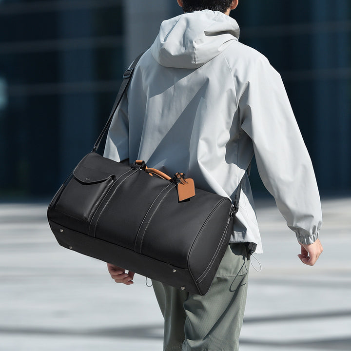 Romslig sports-duffelbag med multifunksjonelle lommer Skanto