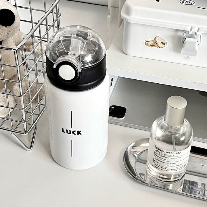 Damen Isoliertrinkflasche mit innovativem Klappdeckel und praktischem Griff Skanto