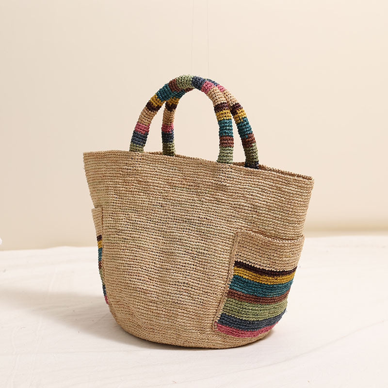 Handmade basket bag with colorful stripe accents Skanto