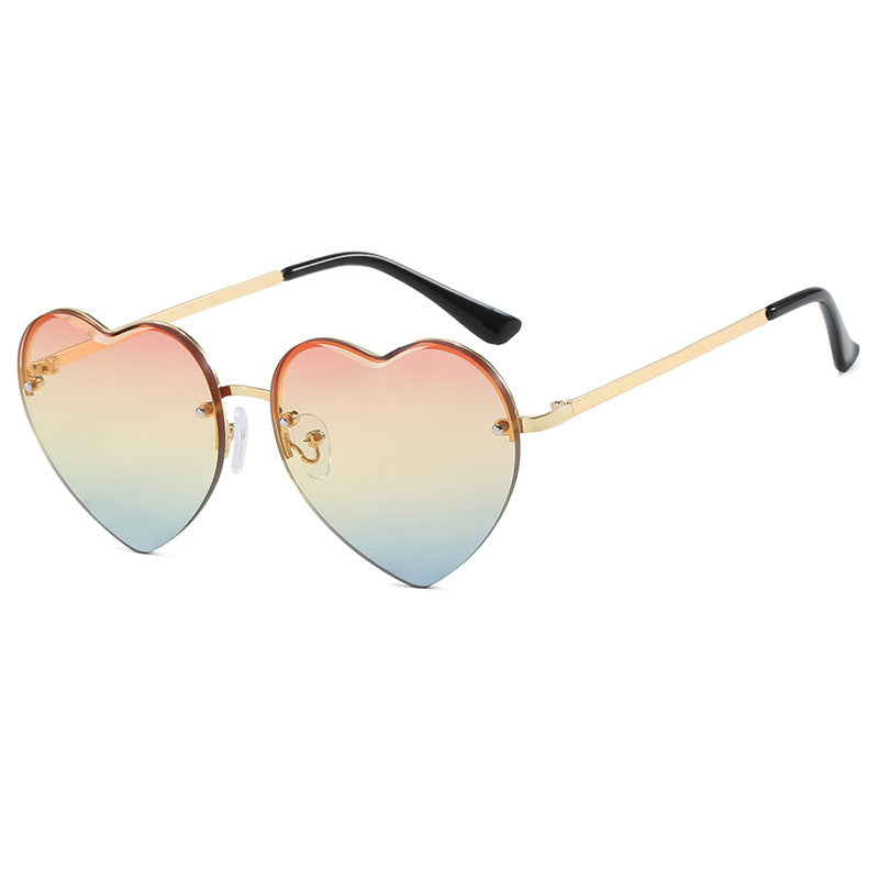 Women's heart-shaped sunglasses with mirrored lenses and modern metal frame Skanto