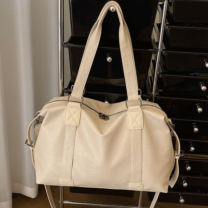 Mangfoldig crossbody-veske Skanto