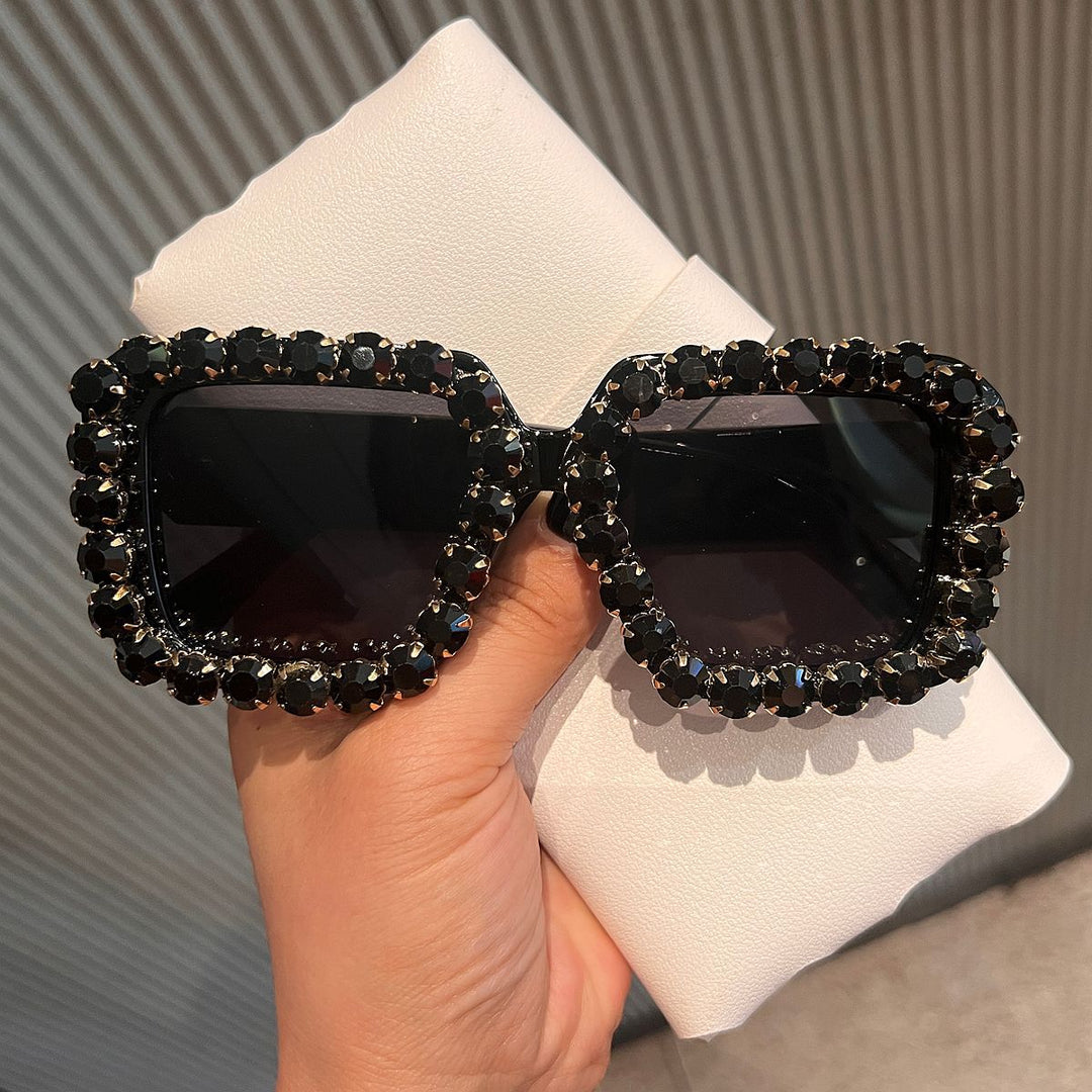 Dame solbrille med glitrende krystallramme Skanto