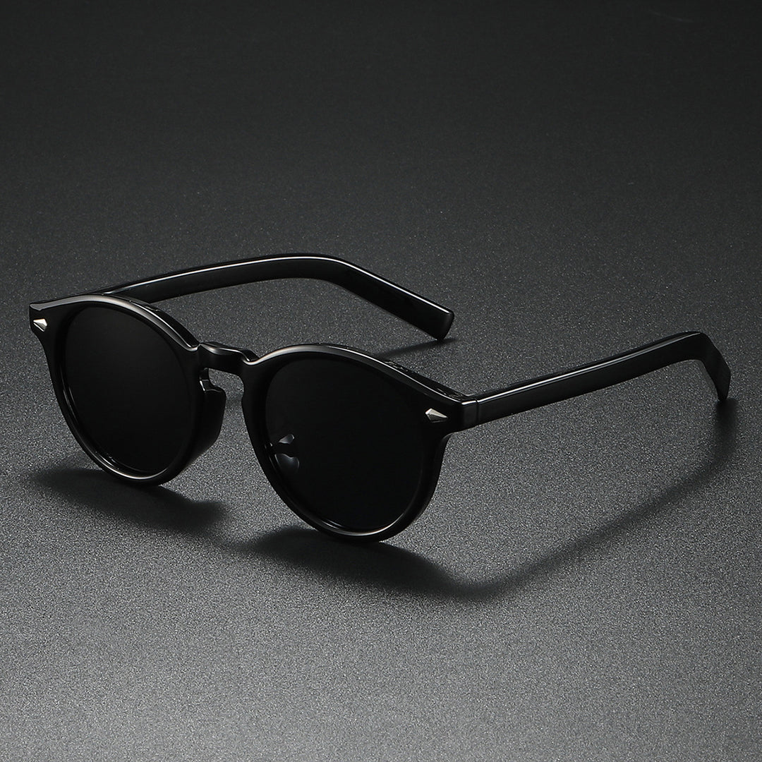 Dame Rund-solbrille med transparent ramme og reflekterende glass Skanto