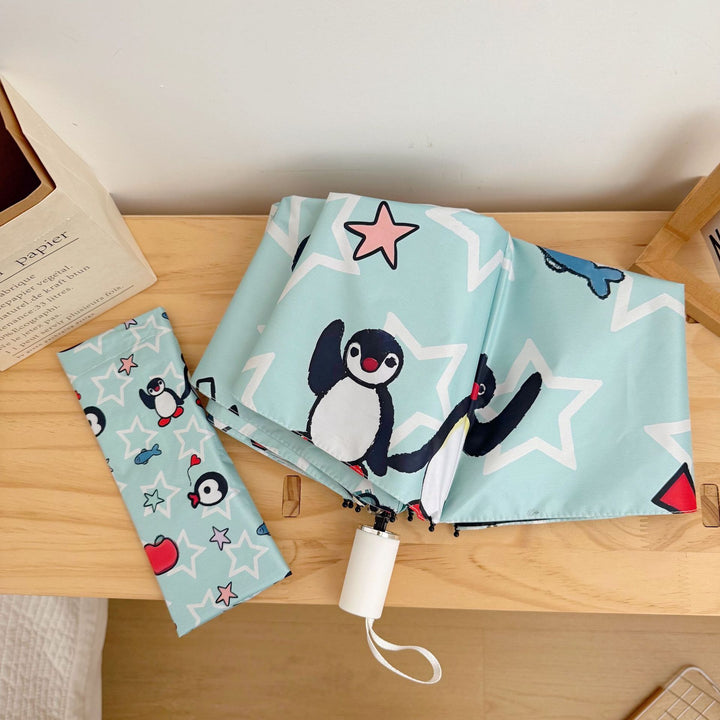 Dame sammenleggbar paraply med leken pingvin-design Skanto