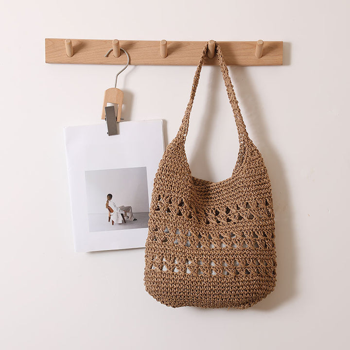 Crocheted shoulder bag with decorative openwork pattern Skanto
