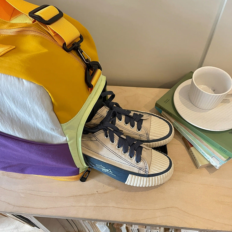 Sporty bæreveske med moderne design og flere rom Skanto