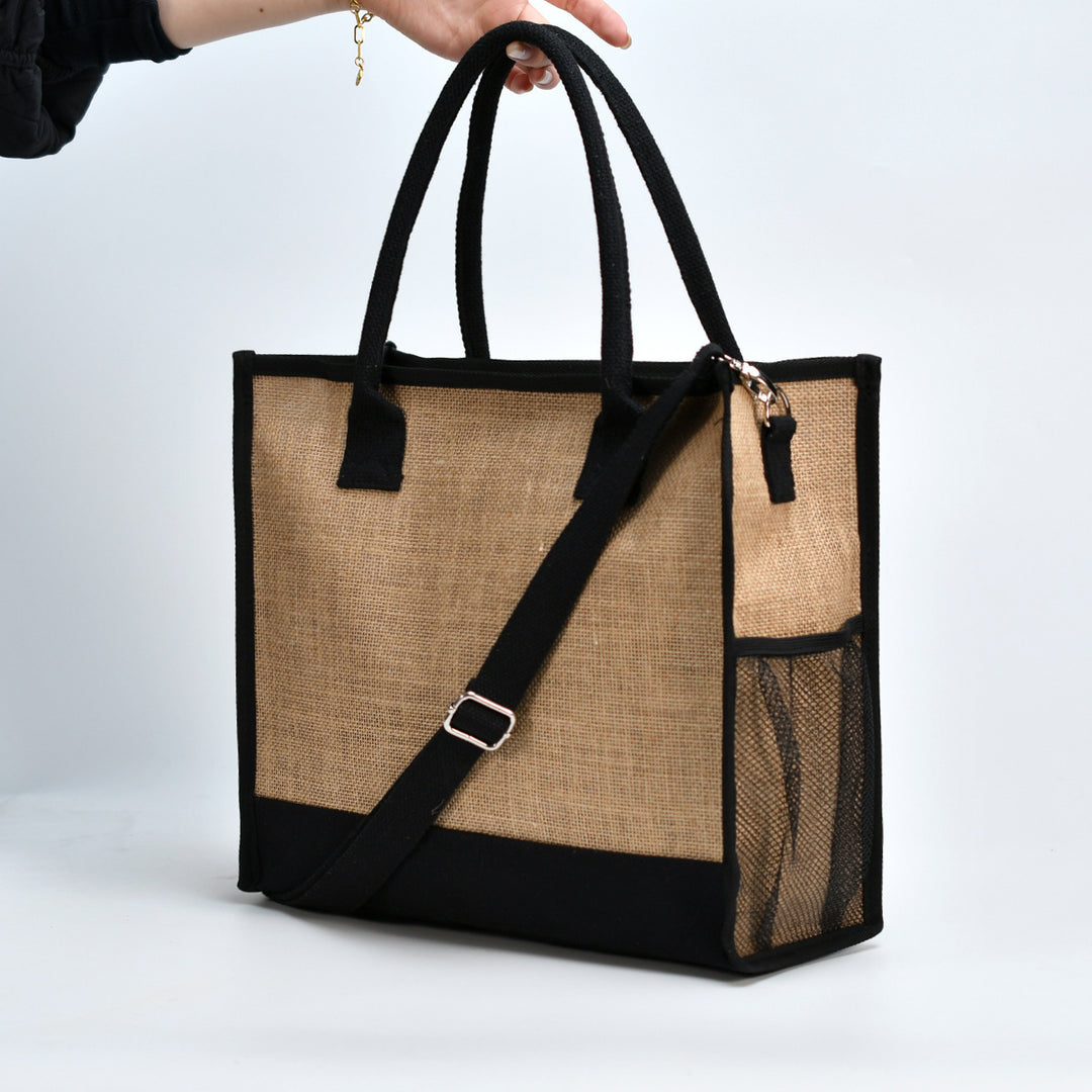 Romslig handleveske i robust jute med nett-side lommer Skanto