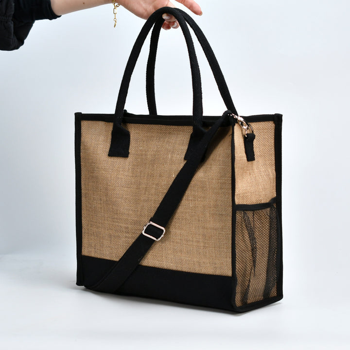 Romslig handleveske i robust jute med nett-side lommer Skanto