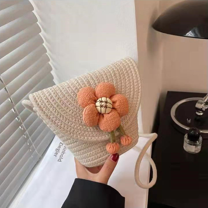 Håndveske med 3D-blomsterapplikasjon Skanto