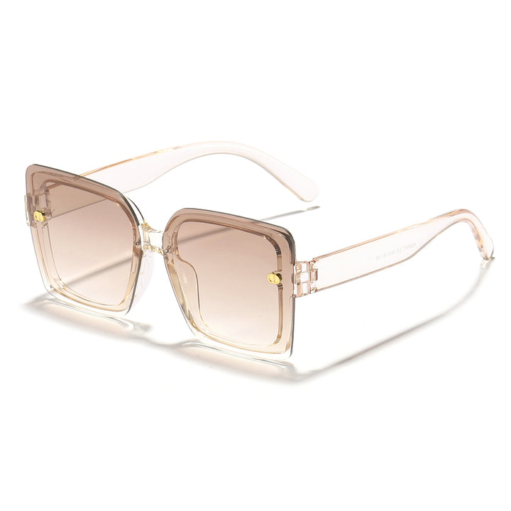 Dame moteriktig solbrille med kvadratisk design og høykvalitets ramme Skanto