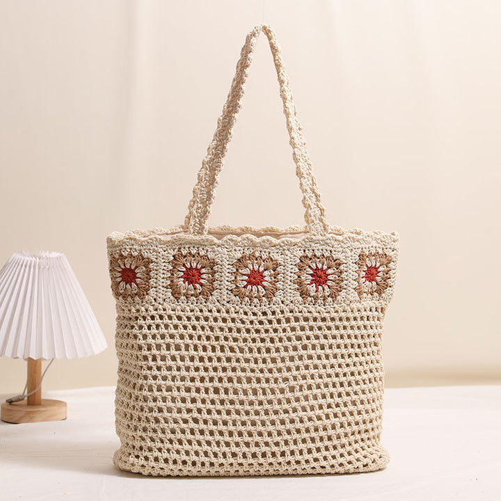 Hand-crocheted beach bag with floral accents Skanto