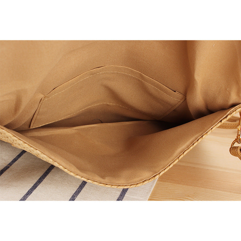 Woven natural material shoulder bag with original wave pattern Skanto