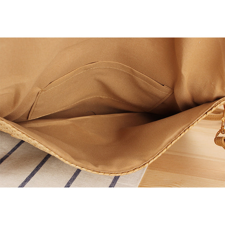 Woven natural material shoulder bag with original wave pattern Skanto