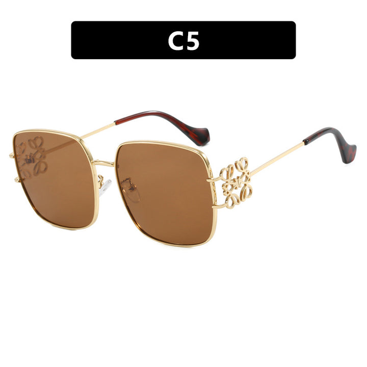 Women's square sunglasses with filigree design and luxurious metal frame Skanto