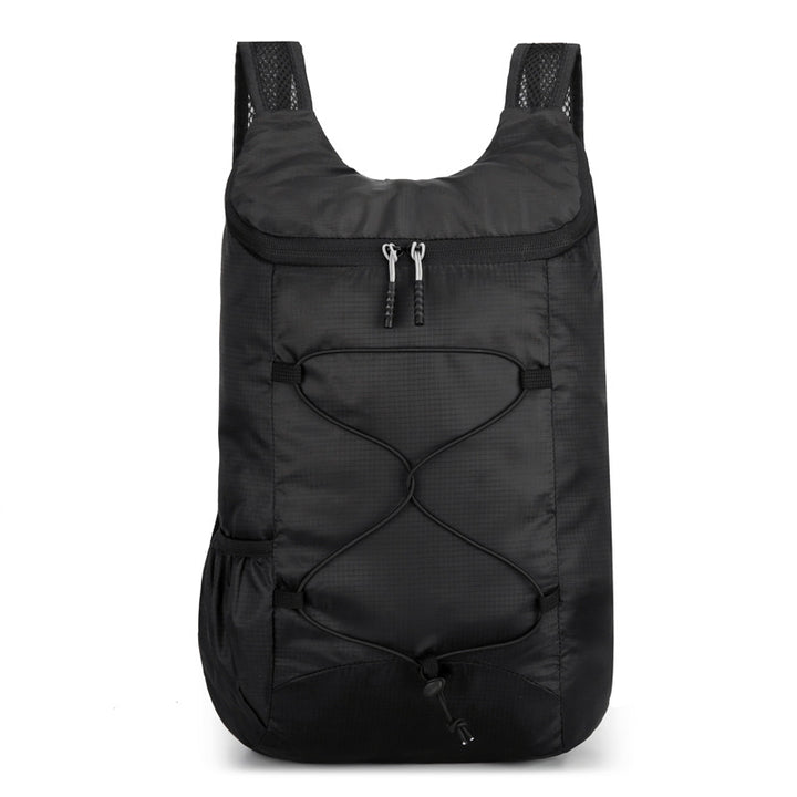 Unisex nan ultralett sammenleggbart dagsryggsekk laget av ripstop med elastisk utvendig bungee og polstrede stropper Skanto