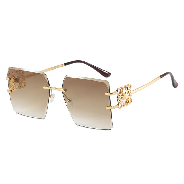 Women's fashionable sunglasses with extraordinary design and gold accents Skanto