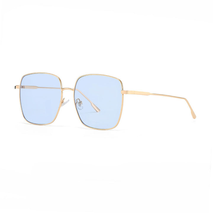 Dame solbrille med moderne firkantet rustfritt stålramme og polarisert glass Skanto