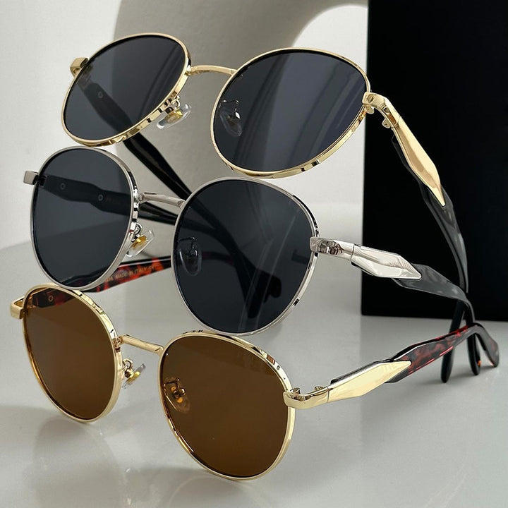 Women's round sunglasses with elegant, gold frame and UV protection Skanto