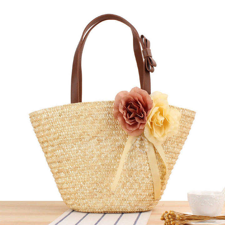 Elegant straw bag with floral motif Skanto